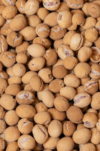 Vertical shot of roasted soy sauce peanuts