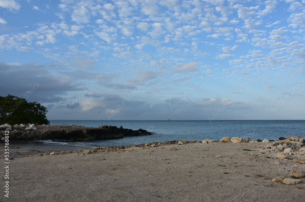 Scattered Clouds Over a Deserted Beach in Aruba