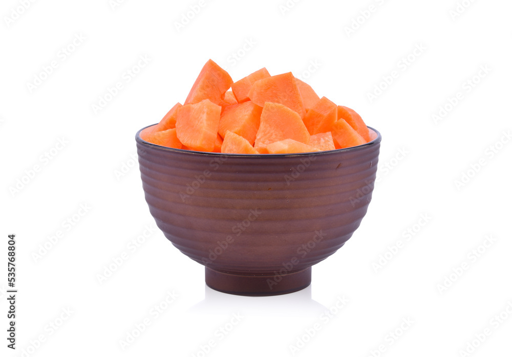 fresh carrots in bowl isolated on white background. fresh carrots in bowl isolated on white background.