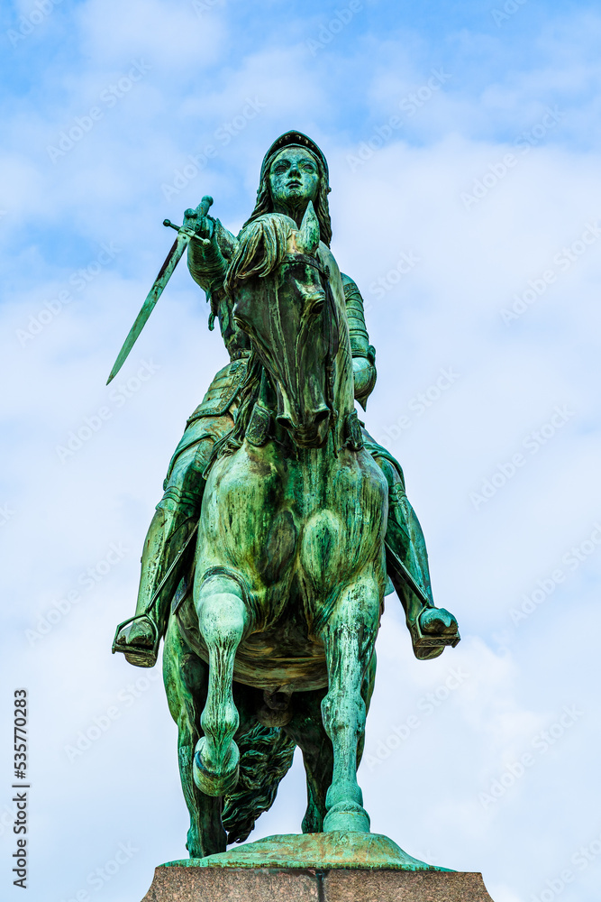 Fototapeta premium Equestrian statue of Joan of Arc (Jeanne d'Arc) in Orleans, France; bronze outdoor monument