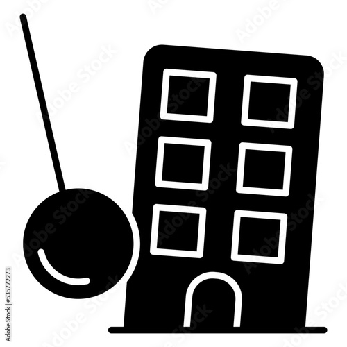 An icon design of wrecking ball with building, demolition vector 