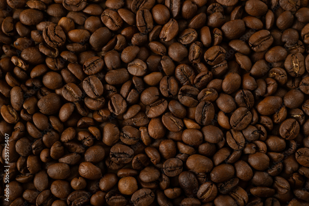 Coffee beans background. Coffee beans close up.