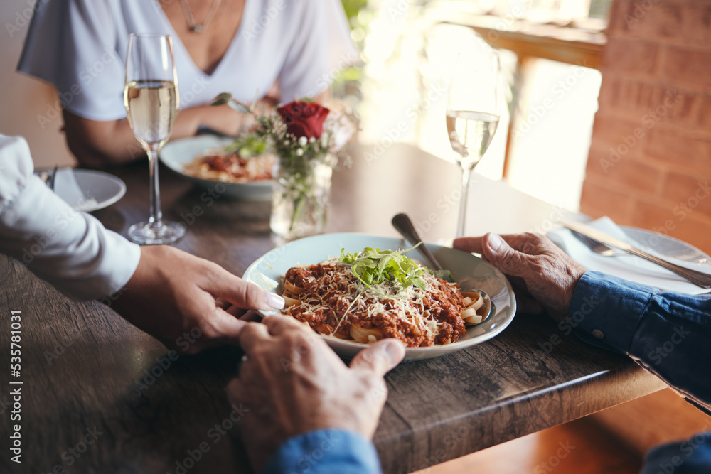 Food service, wine and couple at table with hospitality from waiter at restaurant for lunch. Cafe worker with plate of pasta for man and woman on date for anniversary or marriage at fine dining cafe