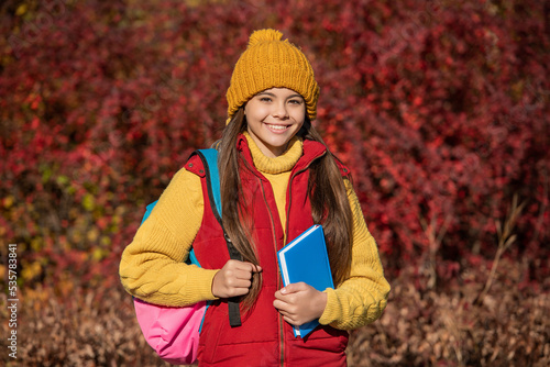 girl student smile back to school in autumn