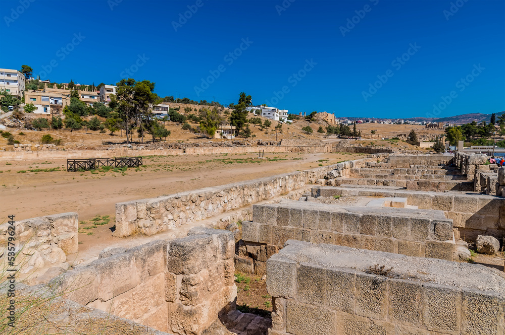 A view across the Hippodrome in the ancient Roman settlement of Gerasa in Jerash, Jordan in summertime