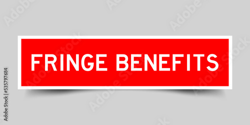 Sticker label with word fringe benefit in red color on gray background