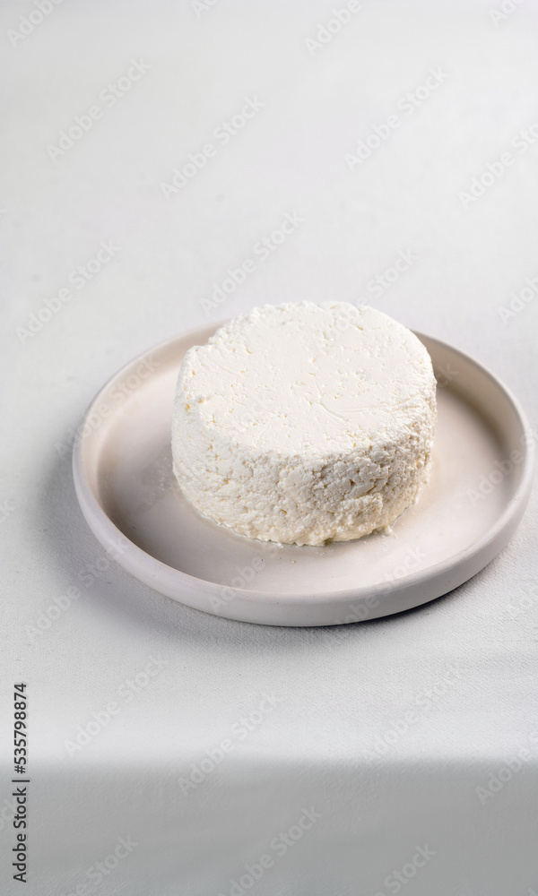 Dairy products on a light background. Table with white tablecloth. Cottage cheese
