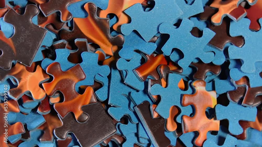 Puzzles No Rotation Background of Colored Puzzle Pieces that Slowly Rotating ...