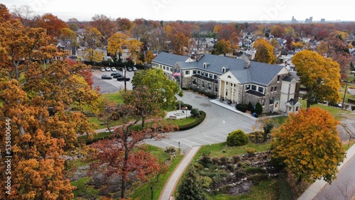 High-angle view of modern buildings surrounded by trees in Eastchester, NYC, USA photo