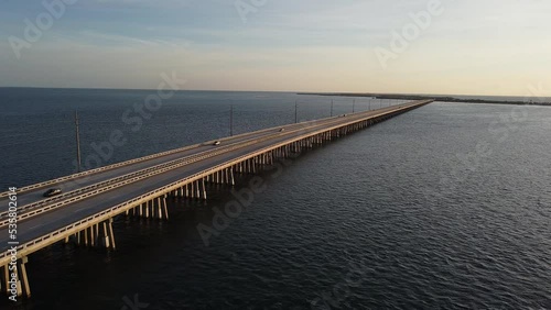 View of Seven Mile Bridge with passing cars. Monroe County, Florida, United States. photo