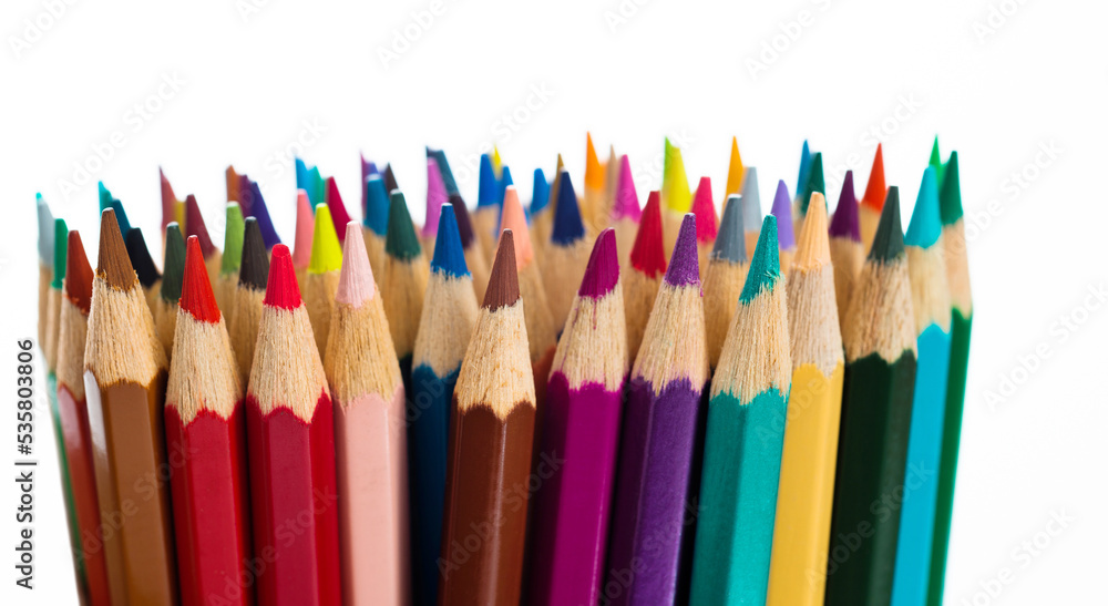 A bunch of colorful pencils on white background A bunch of colorful pencils on white background