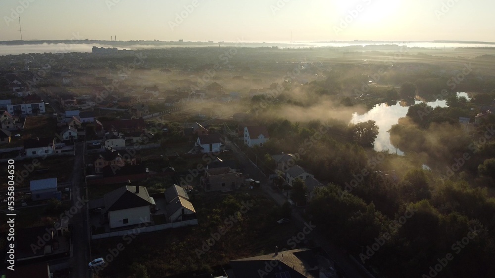 Rural aerial view, fogy morning sunrise.