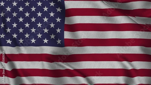 The flag of the United States of America that is waving in the wind.