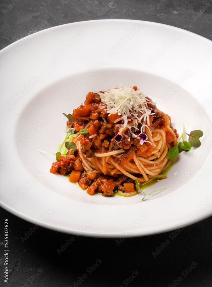 Bolognese pasta on a white plate. Different angles. Bolognese pasta on a white plate. Different angles.