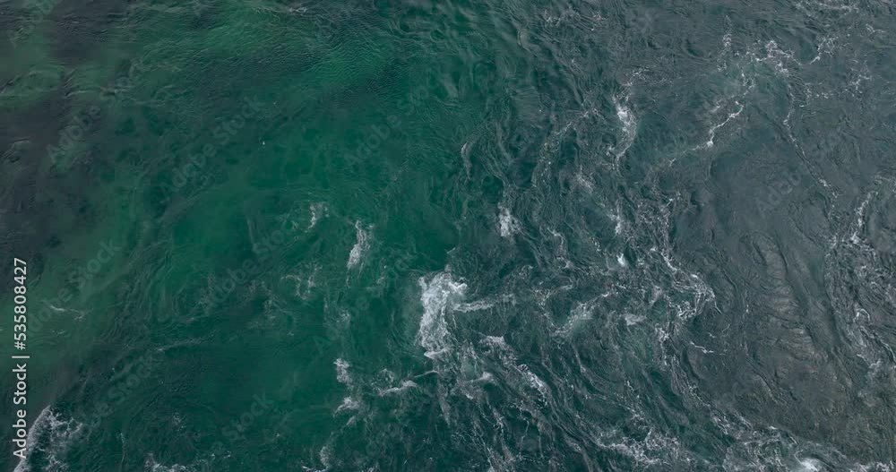 Overhead View Of Open Ocean Tidal Waves In The Northern Norwegian Sea. Aerial Drone Shot Overhead View Of Open Ocean Tidal Waves In The Northern Norwegian Sea. Aerial Drone Shot
