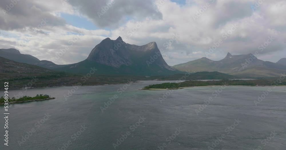 Scenic View Of Mount Stortinden With Idyllic Fjord In Ofoten, Nordland, Norway. Aerial Wide Shot Scenic View Of Mount Stortinden With Idyllic Fjord In Ofoten, Nordland, Norway. Aerial Wide Shot