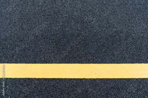 Asphalt road with yellow line © xy