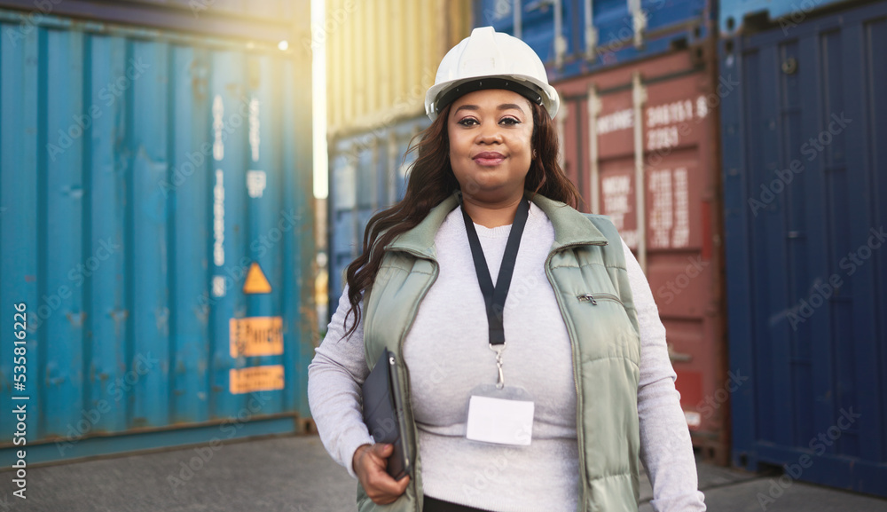 Shipping worker and portrait of black woman at cargo freight containers with tablet for logistics. Assertive, confident and professional African girl in ecommerce delivery management industry. Shipping worker and portrait of black woman at cargo freight containers with tablet for logistics. Assertive, confident and professional African girl in ecommerce delivery management industry.