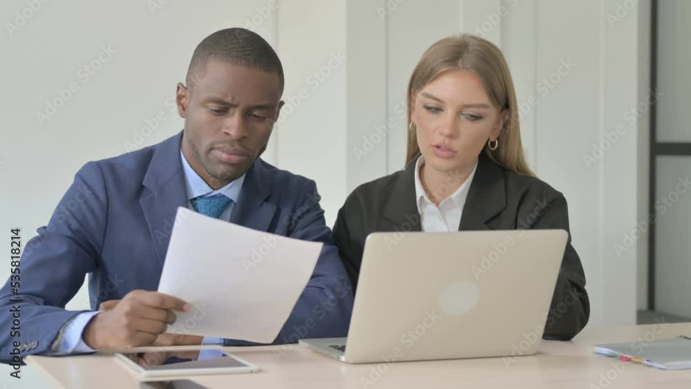 Standing African Businessman Helping Female Employee at Work, Guiding Standing African Businessman Helping Female Employee at Work, Guiding