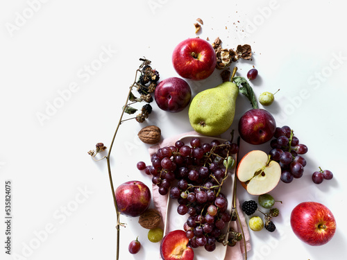 Flatlay with ripe autumn fruits photo