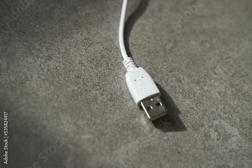 White usb cable. Mobile phone charge