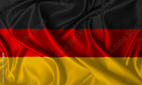 German flag waving in the wind on a silk texture