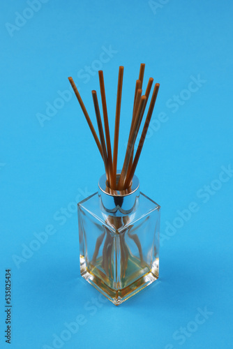 Incense or incense sticks in a decanter. Shallow depth of field