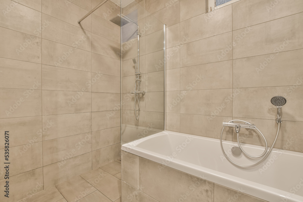 Modern bathroom with glass partition Stock Photo | Adobe Stock