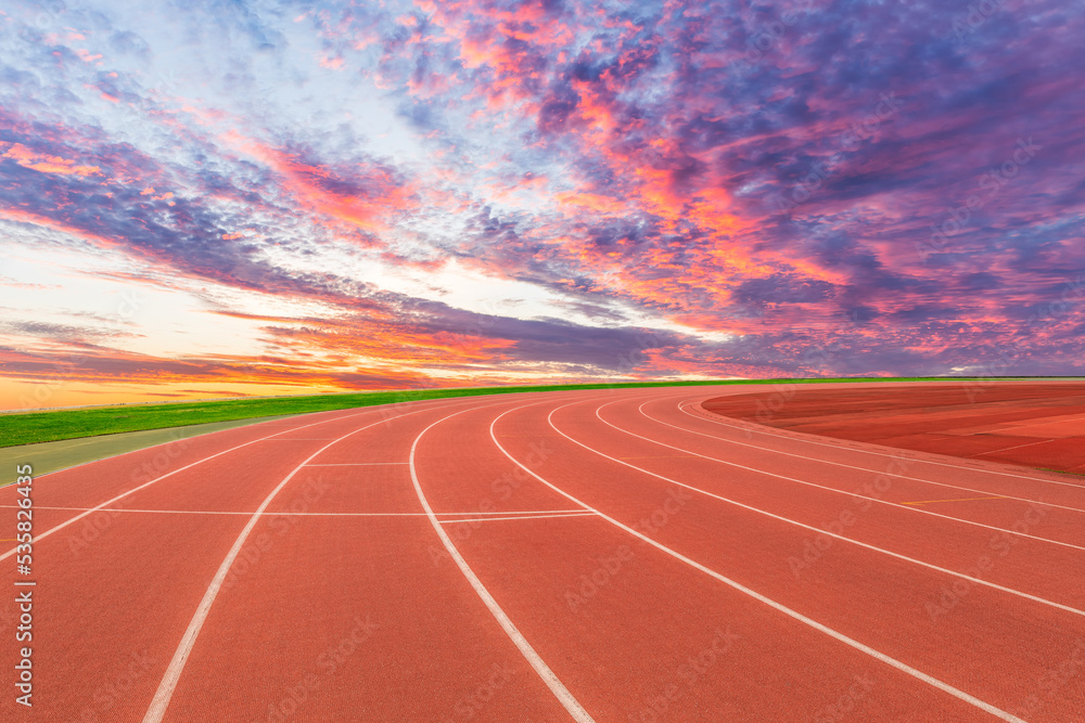 Stadium runway and colorful sky clouds at sunrise