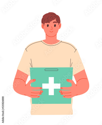 Volunteer with a donation box for medicines