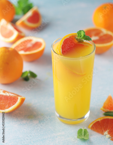 Red oranges juice with mint and ice 