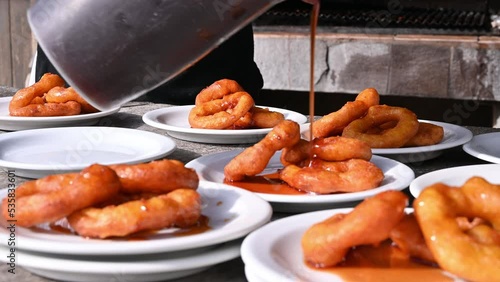 Street food preparation - traditional Peruvian sweets picarones photo