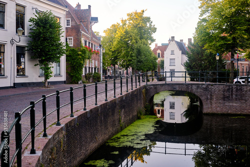 Amersfoort, The Netherlands, August 9, 2022. Old city centre. Railings along a canal on a quiet summer's morning.
