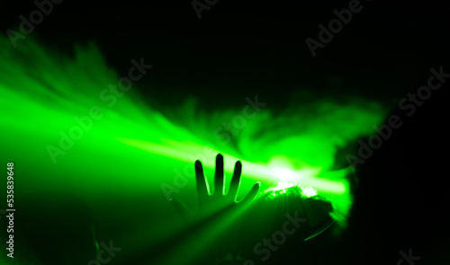 Crowd and blurred green light