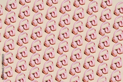 3d illustration of pink music headphones on yellow background