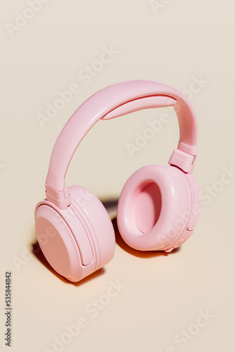 3d illustration of pink music headphones on yellow background