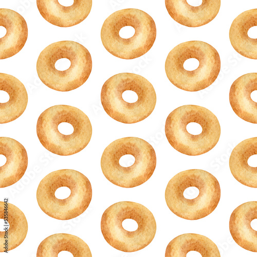 Hand drawn watercolor bagels seamless pattern on white background. Wrapping paper with donuts. Cute and simple fabric or wallpaper print. Sweet baked food