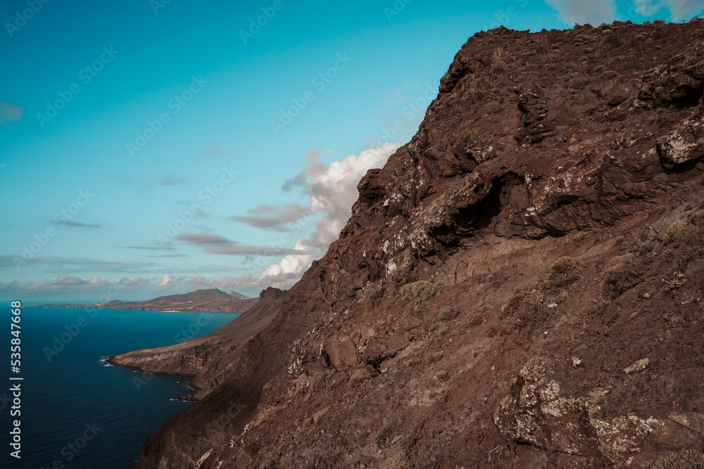 Volcanic cliff over the sea