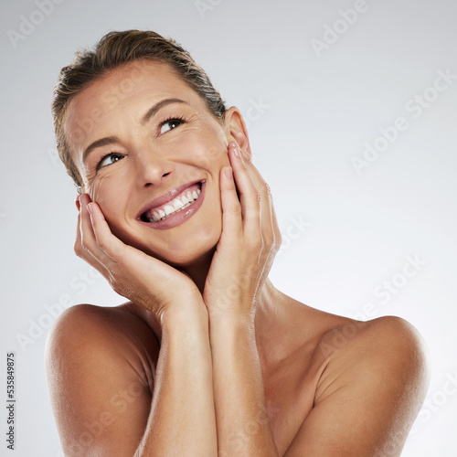 Cuadro en lienzo Beauty, face and happy mature woman glowing skincare, dermatology and anti aging cosmetics on grey studio background in Canada