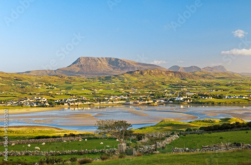 South over the village of Dunfanaghy from near Horn Head toward Muckish Mountain on north Donegal coast, Ireland. Summer evening photo