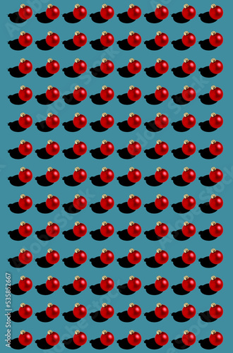 seamless red Christmas balls pattern on blue background 