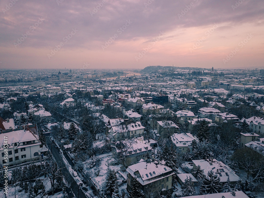 aerial view over the city in winter time