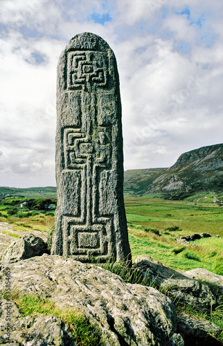 Celtic Christian stone carving in Glencolumbkille on the Wild Atlantic Way, Donegal, Ireland. One of the pilgrimage circuit stations photo