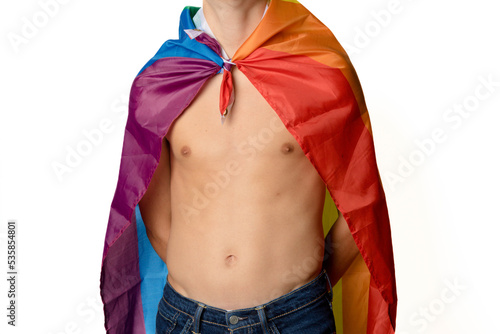A Teenage Boy wrapped in A Pride Flag