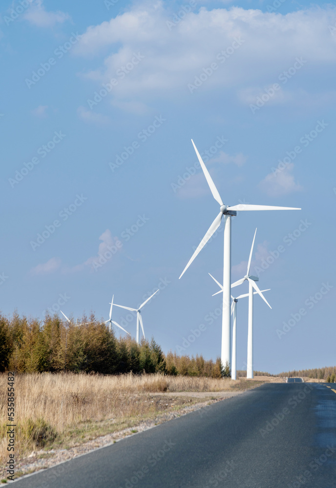 Fototapeta premium Landscape of highway and windmills