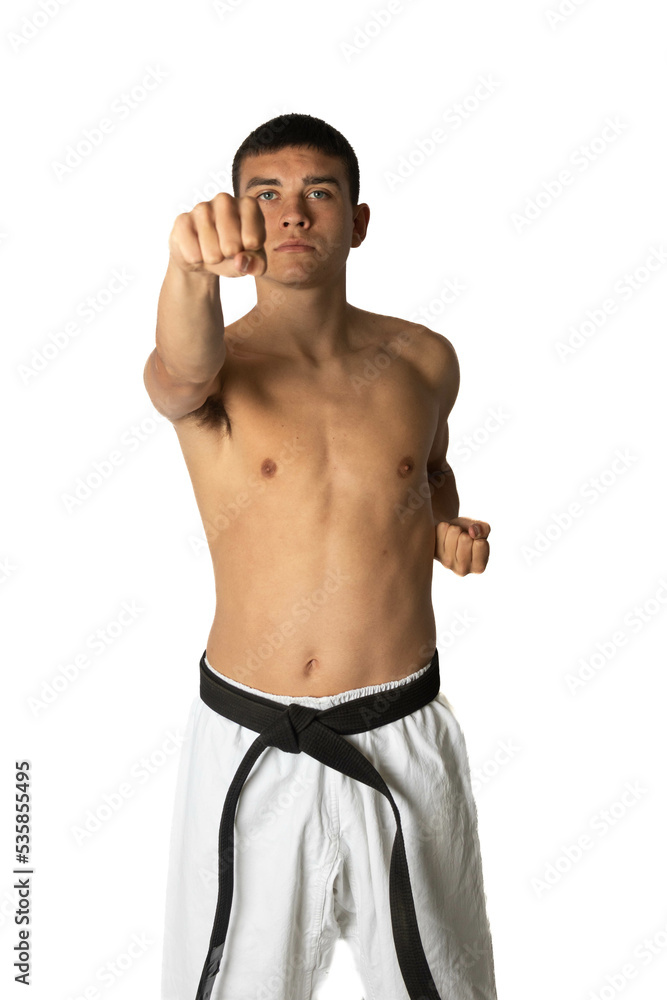 Fototapeta premium 19 Year Old Practacing a Karate Head Punch