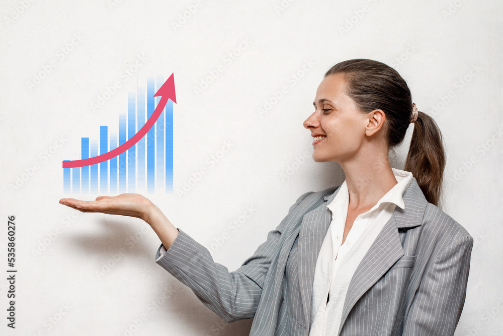 Caucasian successful confident woman in white shirt and gray jacket presenting or showing open hand palm with copy space for product isolated on white background Caucasian successful confident woman in white shirt and gray jacket presenting or showing open hand palm with copy space for product isolated on white background
