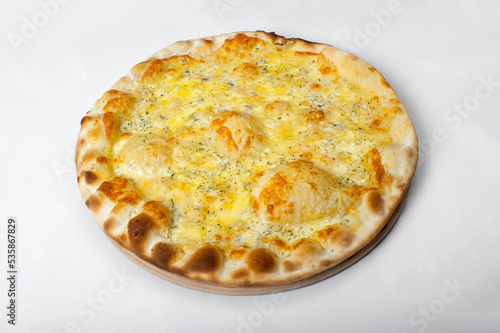 Cheese pizza served on wooden board