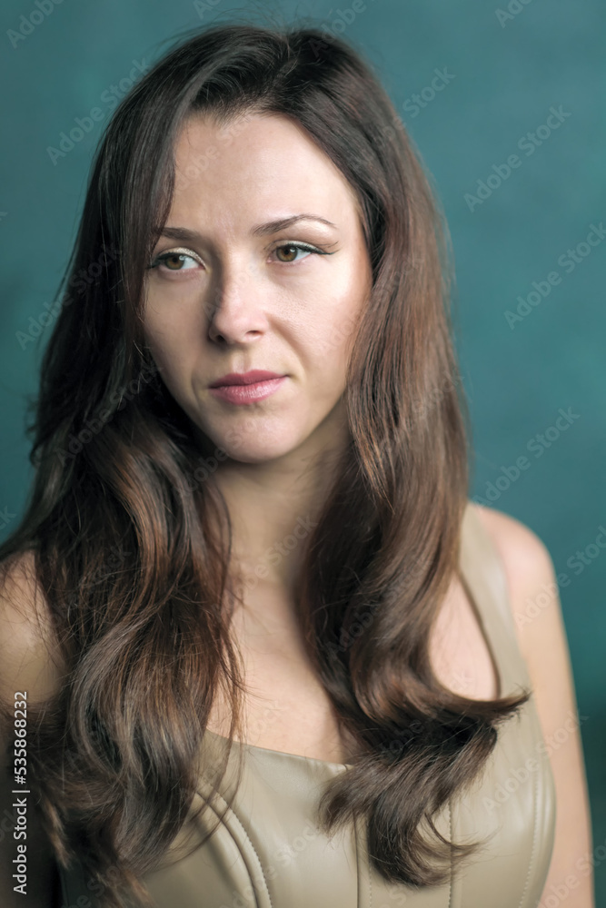 Portrait of a young attractive brunette girl