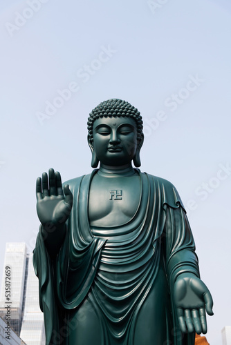 Big Buddha statue under blue sky